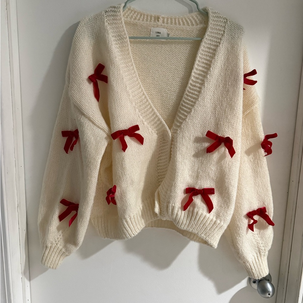 Elegant Cream Cardigan with Red Bow Details